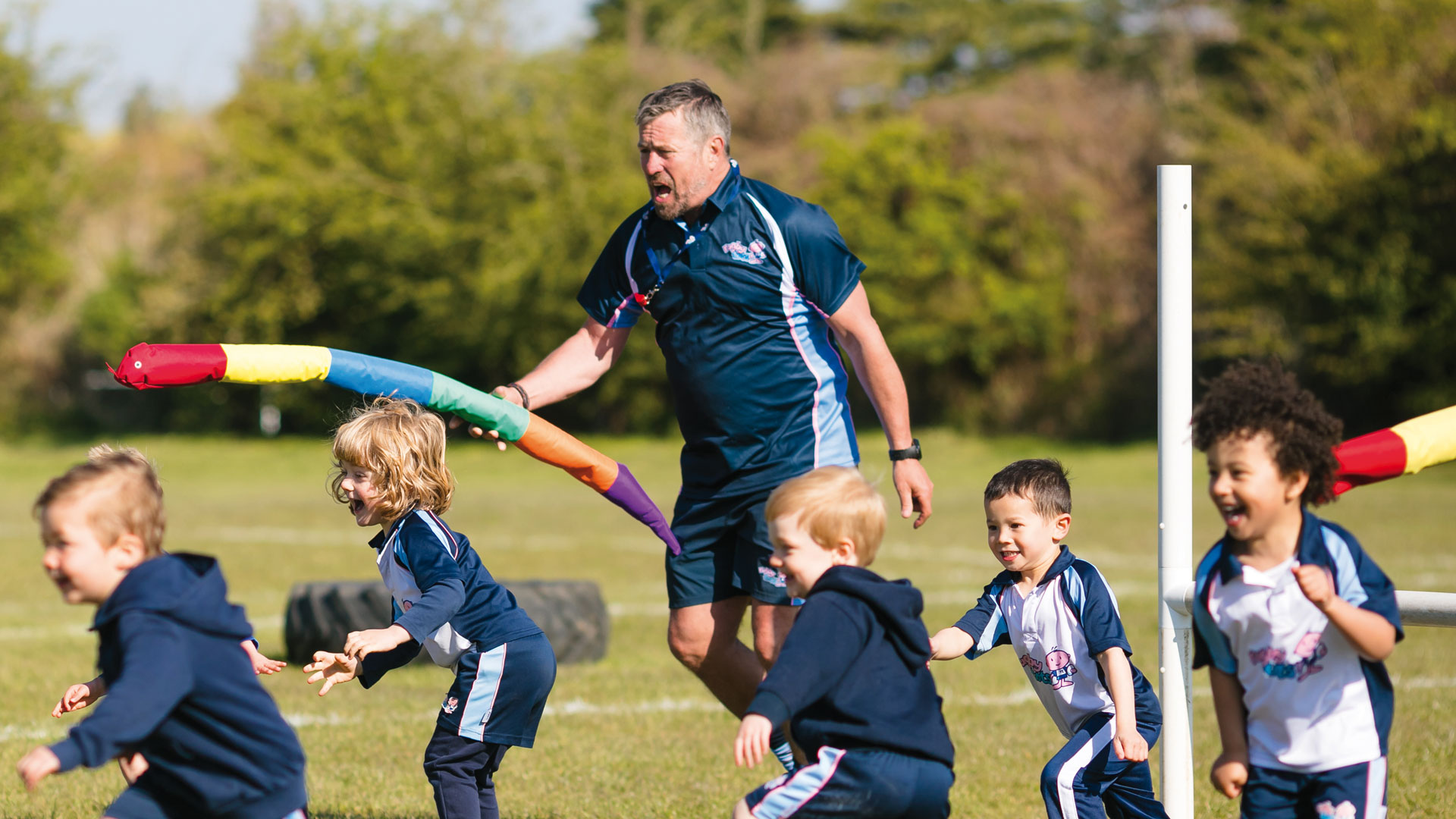 Rugbytots coach leading a class.
